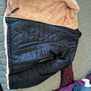 Size medium jacket ( fits more like teen size )